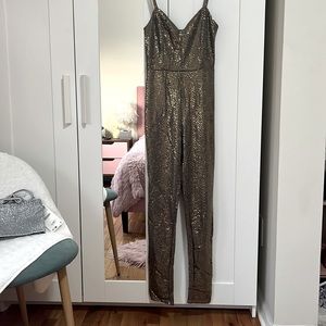 Blue s jump suit gold color